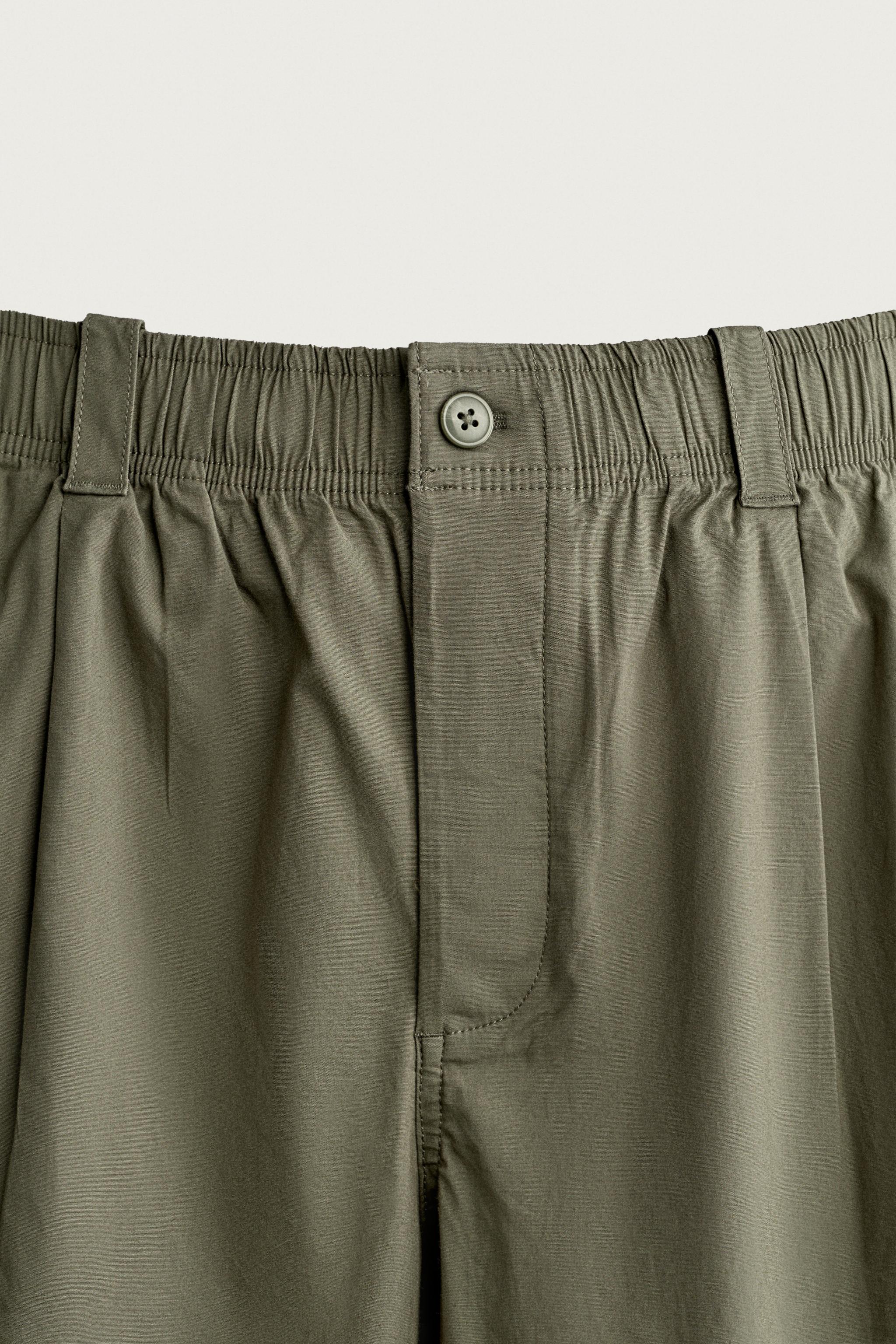 RELAXED FIT PLEATED JOGGER PANTS